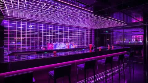 Sliding camera revealing neon nightclub bar with LED grid, reflective counter and bottles