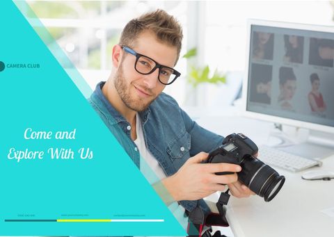 Smiling Photographer Holding DSLR in Studio Office Environment - Download Free Stock Templates Pikwizard.com