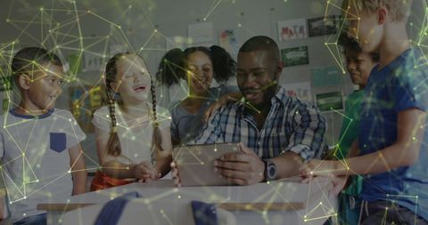 Teacher and Students Exploring Digital Technology in Classroom