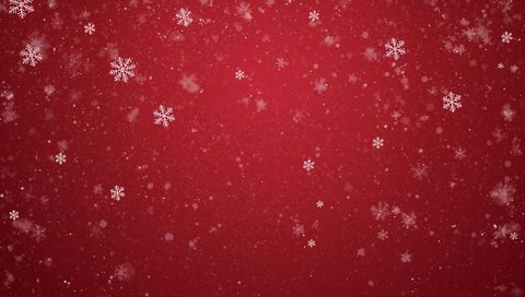 Festive red backdrop with falling snowflakes, bokeh sparkle and soft vignette for holiday design