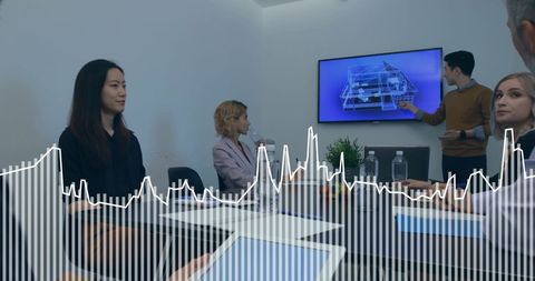 Business Team Analyzing Data Visualization in Office Meeting