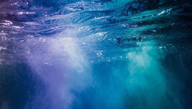 Abstract Underwater Scene with Sunbeams and Bubbles