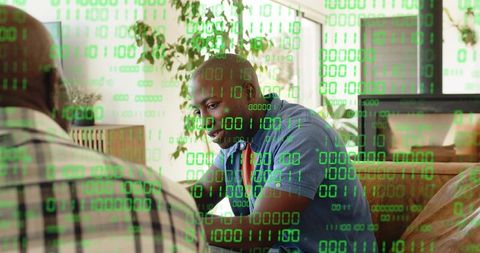 Black consultant discussing digital transformation with senior client, binary code overlay