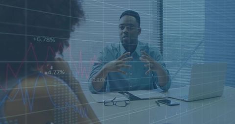 Business Meeting with Data Analytics Graphics