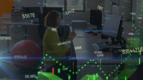 Innovative Woman Analyzing Financial Data in Technology Office
