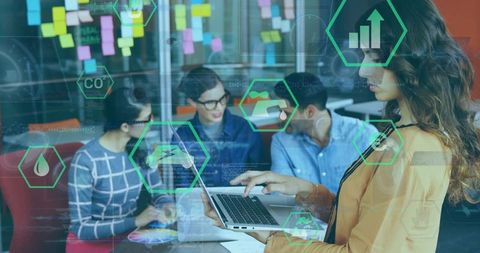 Businesswoman Leveraging Technology for Team Innovation