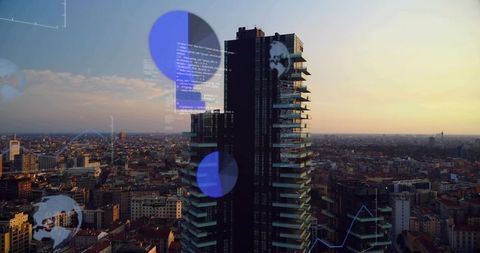High-rise tower dominating urban skyline at sunset displaying blue infographics and data overlays