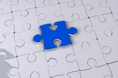 Transparent background puzzle with blue piece highlights concept