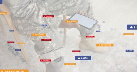 Soldier holding smartphone surrounded by floating social media notifications and alerts