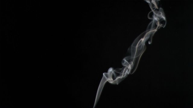 Mystical image capturing plumes of smoke rising gracefully against a black background. Suitable for adding an abstract or artistic touch in design projects, advertisements, and themed presentations. Excellent for illustrating concepts of mystery, uncertainty, or ethereal beauty.