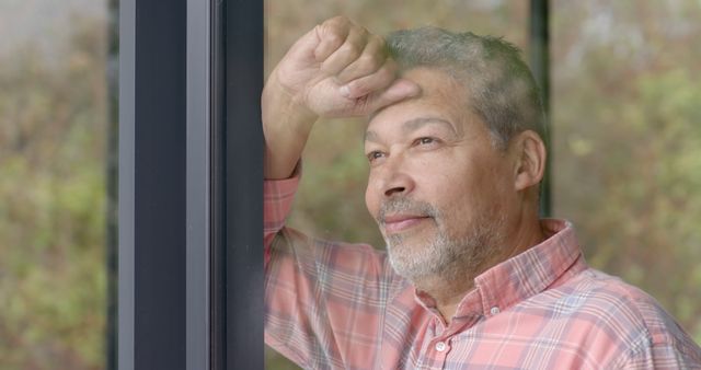 Man Pondering While Looking Out Window - Download Free Stock Images Pikwizard.com