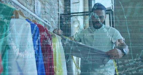 Tailor inspecting garment with measuring tape and market data overlay in boutique studio