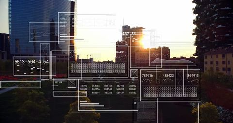 Futuristic Data Overlay in Urban Skyline at Sunset