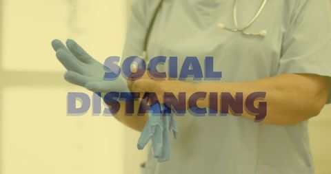 Surgeon Wearing Gloves Promoting Social Distancing During Pandemic