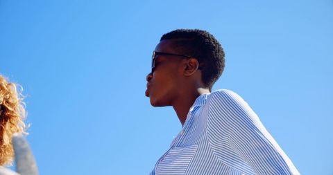 Stylish Young African American Woman Enjoying Sunny Day