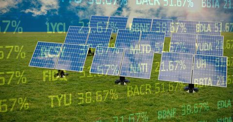 Solar panels on field with stock data: investment and sustainability