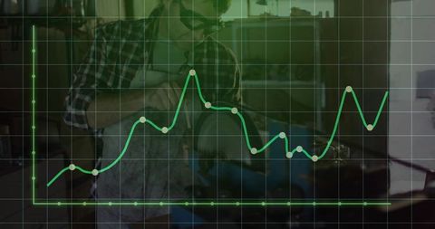 Carpenter Enhancing Plank in Workshop with Growth Chart Superimposed