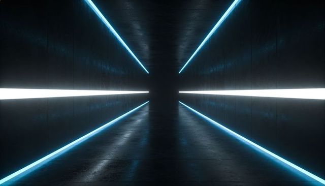 Futuristic led corridor leading to vanishing point in dark minimal symmetrical tunnel