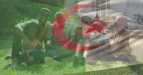 Multi-generational family enjoying sunny lawn with red crescent flag overlay