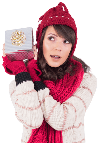 Curious Woman in Winter Attire Holding Gift Transparent