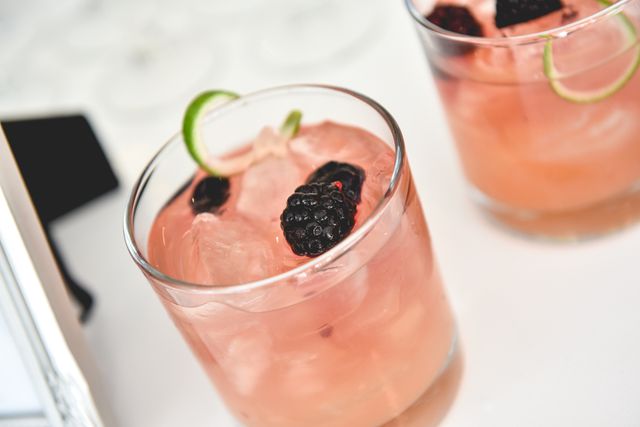 Refreshing Pink Blackberry Cocktail with Lime on Ice - Download Free Stock Photos Pikwizard.com