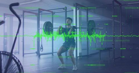 Man squatting with barbell and digital metrics overlay in gym