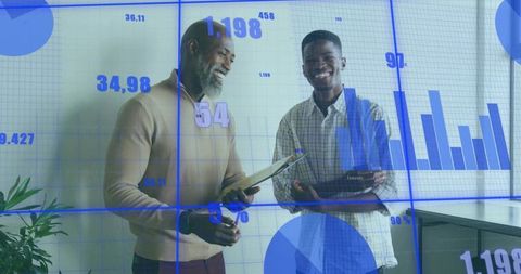 Colleagues Discussing Data in Modern Office Setting