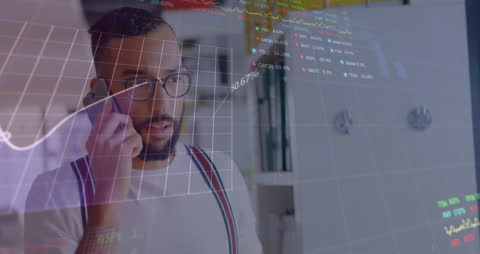 Businessman with Financial Data Hologram