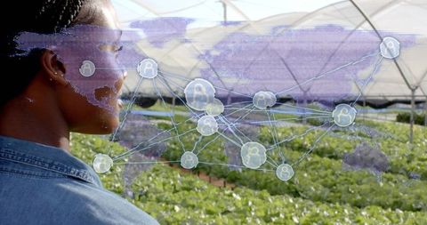 Researcher utilizing advanced technology in sustainable agriculture