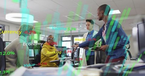 Diverse Business Team Analyzing Economic Data in Modern Office