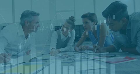 Business Team Analyzing Financial Data in Collaborative Office Meeting