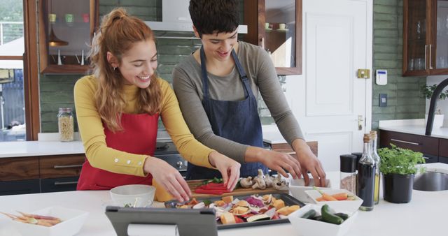 Two Friends Preparing Vegetables in Modern Kitchen - Download Free Stock Images Pikwizard.com