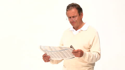 Middle-Aged Man Engaged in Newspaper Reading on White Background