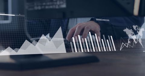 Businessperson Analyzing Financial Graphs on Screen - Download Free Stock Images Pikwizard.com
