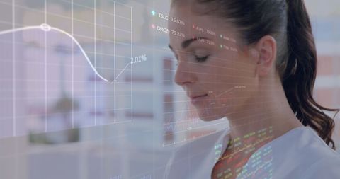 Woman Analyzing Financial Trends with Digital Charts Overlay