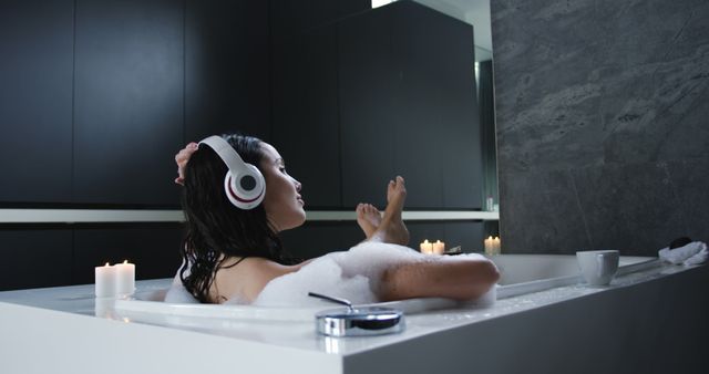 Woman Relaxing in Bathtub Wearing Headphones - Download Free Stock Images Pikwizard.com
