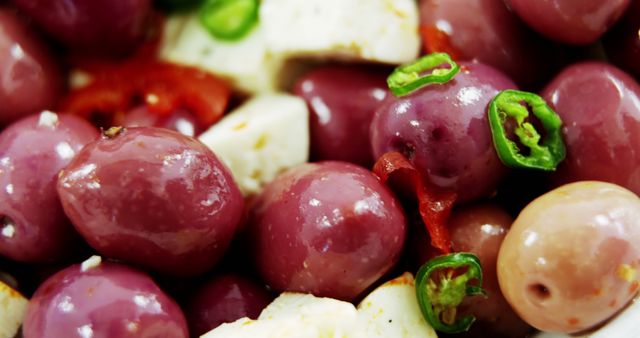 Close-up of Marinated Olives and Cheese with Fresh Chilies - Download Free Stock Images Pikwizard.com