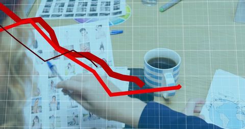 Team Collaborating Over Analytics with Declining Graph Superimposed