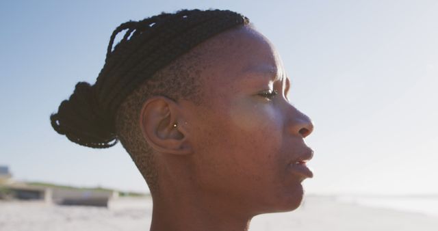 Serenity at the Beach: Woman Reflecting in Morning Light - Download Free Stock Images Pikwizard.com