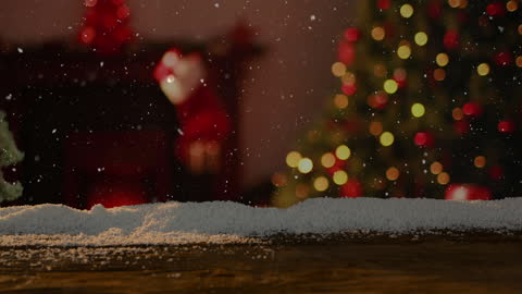 Snow Falling Over Cozy Christmas Setting with Tree and Fireplace