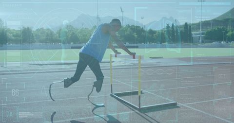Athlete with Prosthetic Legs Training on Track with Digital Interface Overlay