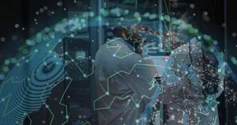 IT Technicians Analyzing Servers in High-Tech Data Center