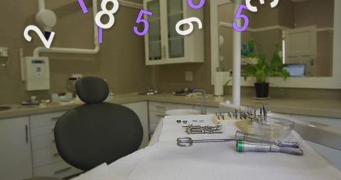 Sterile dental instruments in clinic operatory with floating digital numbers