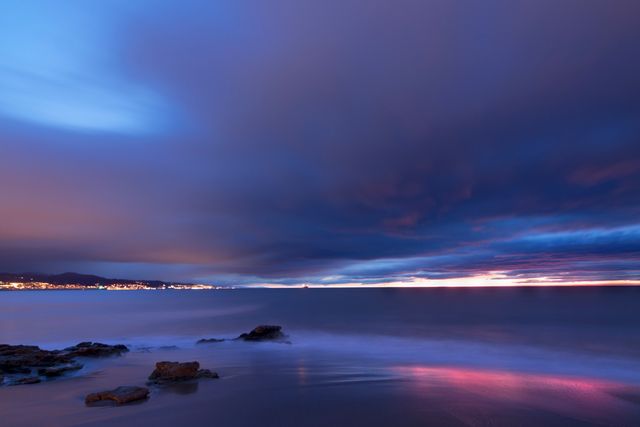 Tranquil Seascape at Twilight with Colorful Sky - Download Free Stock Photos Pikwizard.com
