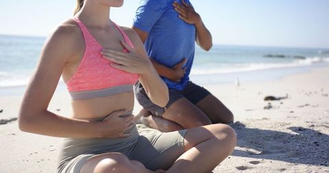 Couple Meditating on Sunny Beach Promoting Mindfulness - Download Free Stock Images Pikwizard.com