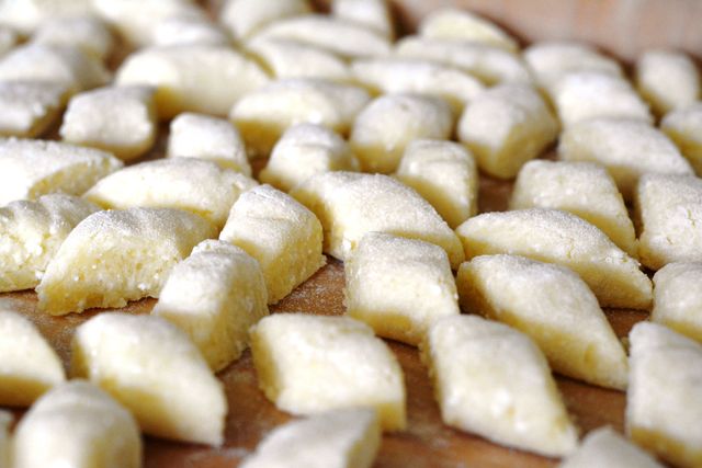 Freshly Prepared Raw Gnocchi on Wooden Surface Ready for Cooking - Download Free Stock Photos Pikwizard.com
