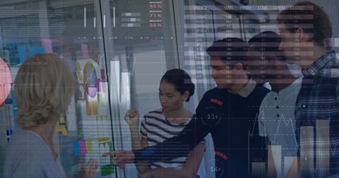 Diverse Team Analyzing Data and Trends in Office Setting