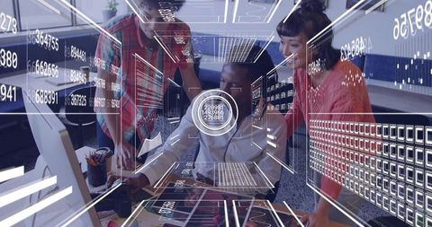 Diverse team collaborating with augmented reality data overlays at futuristic workstation