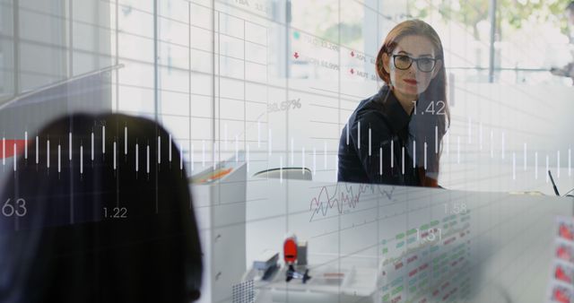 Businesswoman Analyzing Financial Data on Modern Trading Screen - Download Free Stock Images Pikwizard.com