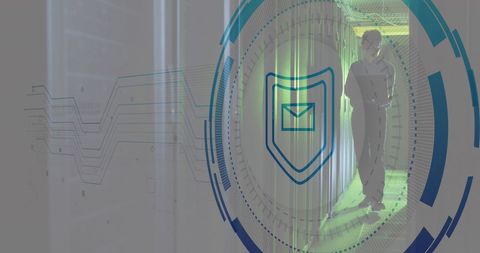Engineer Ensuring Security in Data Center with Digital Shield Overlay - Download Free Stock Images Pikwizard.com
